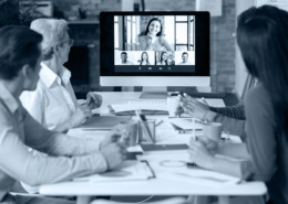 Hybrid event strategy meeting with remote and in-person teams at Plan and Pivot Events