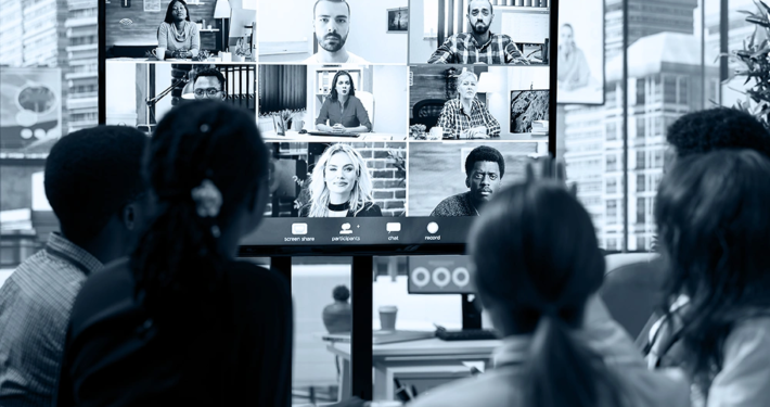 B2B event planning team in a hybrid strategy session with remote participants at Plan and Pivot Events